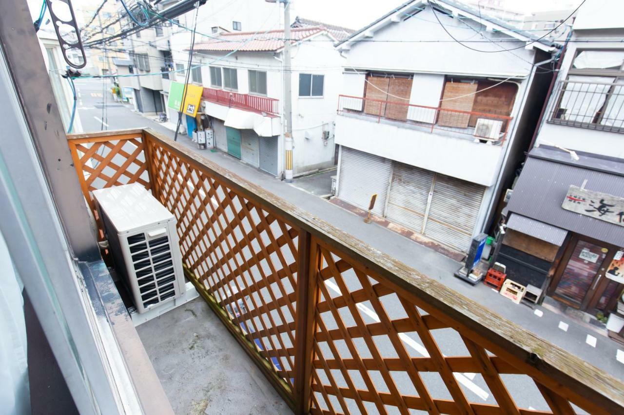 大阪市 Mon岸里玉出駅前ヴィラ エクステリア 写真